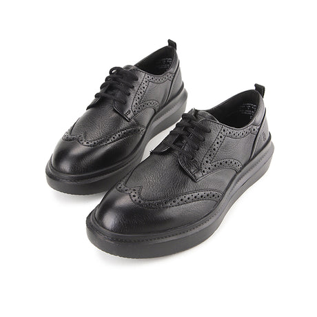 Joy Wingtip In Bold Black Leather
